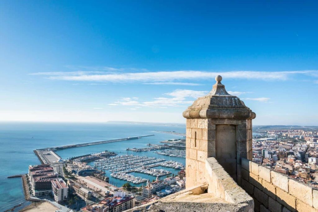 Views from the Castle of Santa Barbara in Alicante towards the harbour to talk about where the Costa Blanca is.