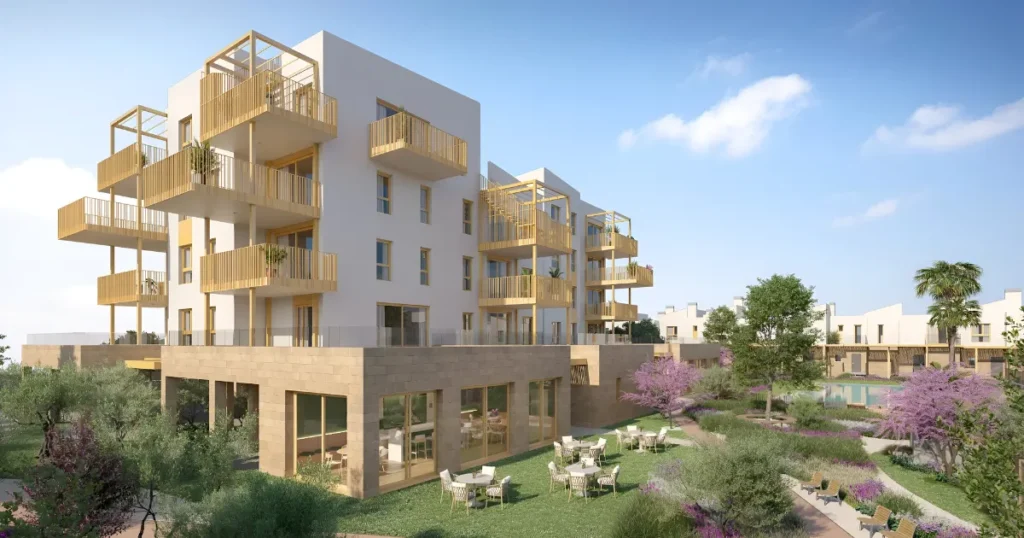 Nowoczesne budynki z tarasami i ogrodami w Talasa Utopian Village, spokojnym i pe?nym natury otoczeniu.
