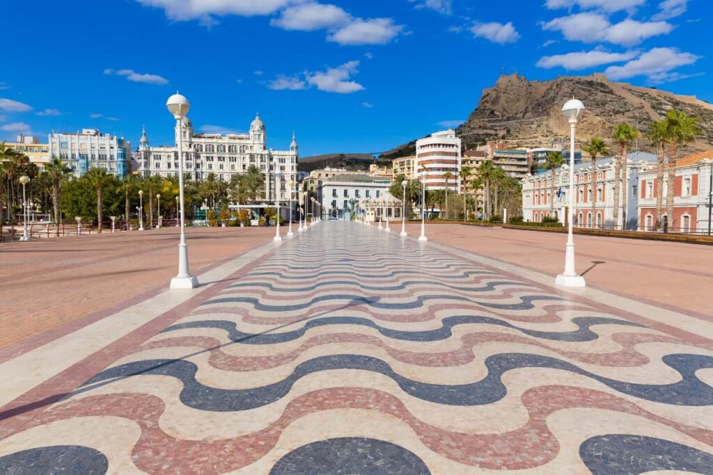 Alicante esplanade promenade with the Castle of Santa B?rbara in the background.
